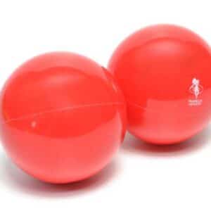 This is an image of two universal mini franklin pilates balls they are at an angle. On the front you can see the Franklin Pilates logo which is white and looks like someone dancing with their arms swirling