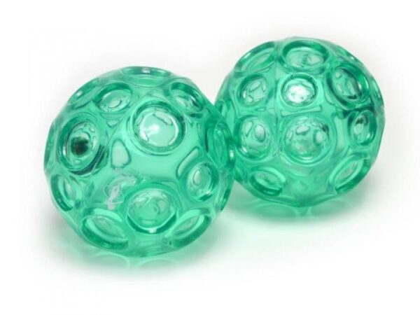 A pair of green franklin balls on a white background they are next to each other at a slight angle to each other.