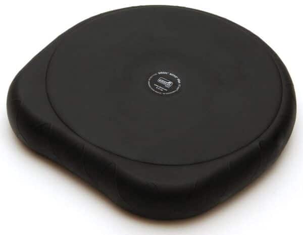 A black Sissel sitfit plus cushion. It has a slightly different shape to it that the SitFit which is circular. This inflatable cushion has a flat sitting surface. One side is circular and the opposite side has contours where your thighs would sit. It is more stable when you sit on it that way round. In the centre is the Sissel logo and the name of the product stamped in white print. The detail around the logo is in a circle.