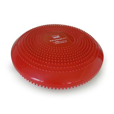 This is a red disc that you can see is inflated it is rasied but has a flatter surface top and bottom. You can make out that the underside has longer bobbles than the upper surface. In the middle in white is the Sissel logo