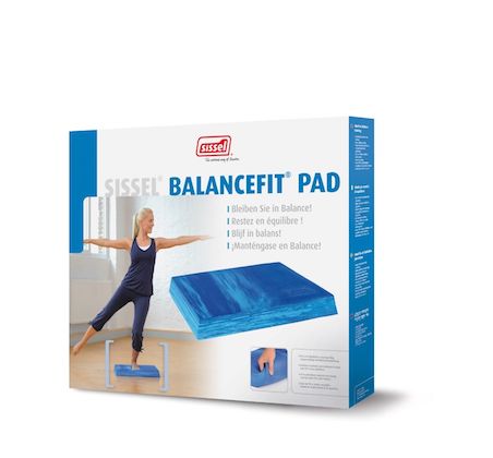 The product box for the Sissel balance fit pad. It has a blue marble effect balance pad on it the wording and sissel logo and the image of a lady standing on one leg balancing on the balance pad with her arms outstretched to the side.