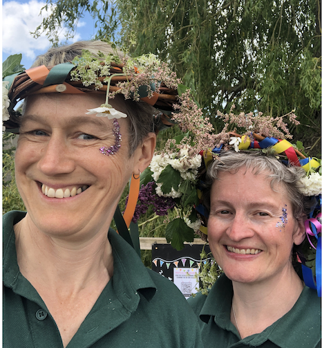 Lorna and Rachael Mayfestival Committee Lorna and Rachael from Sittingwell wearing willow headdresses at their village Mayfestival as Committee members